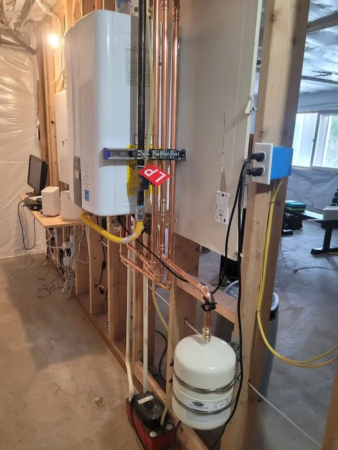 Licensed plumber repairing a kitchen sink in Northlake